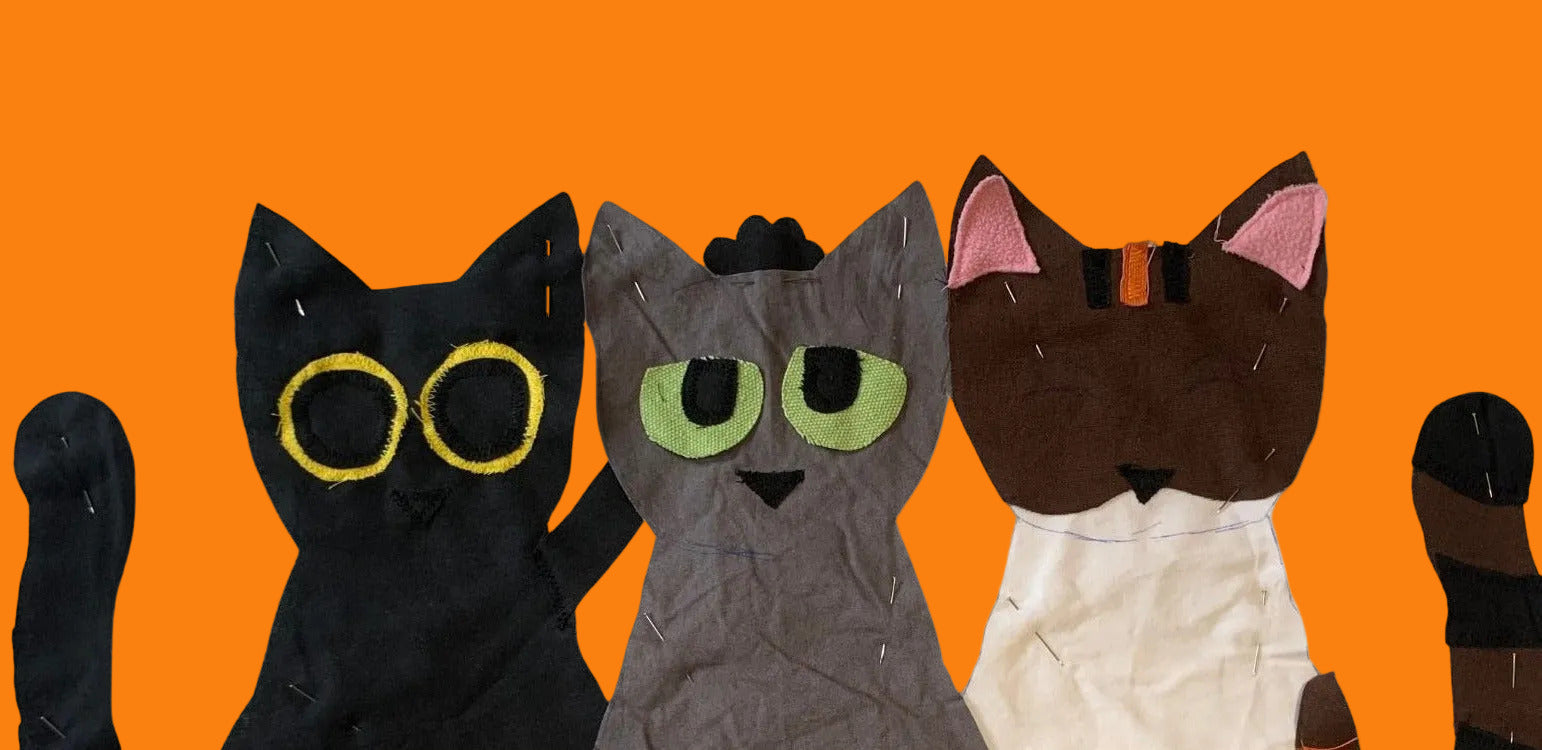 Photo d'une personnalisation de trois chats pour un pull